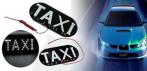 На яркий светодиодный знак «Taxi» на стекло автомобиля
